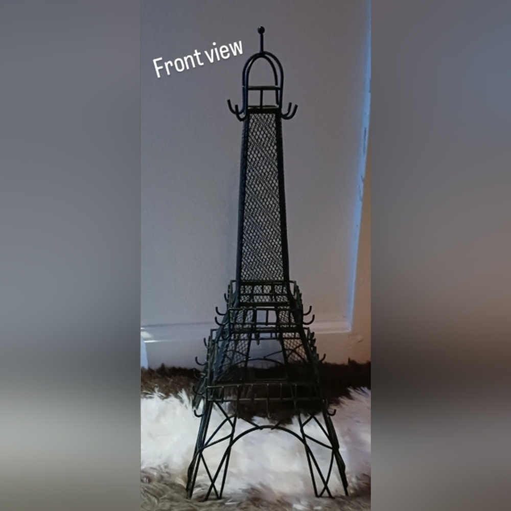 Black wire mesh Eiffle Tower jewelry holder.
